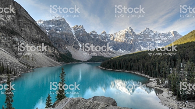stream with mountains in the background